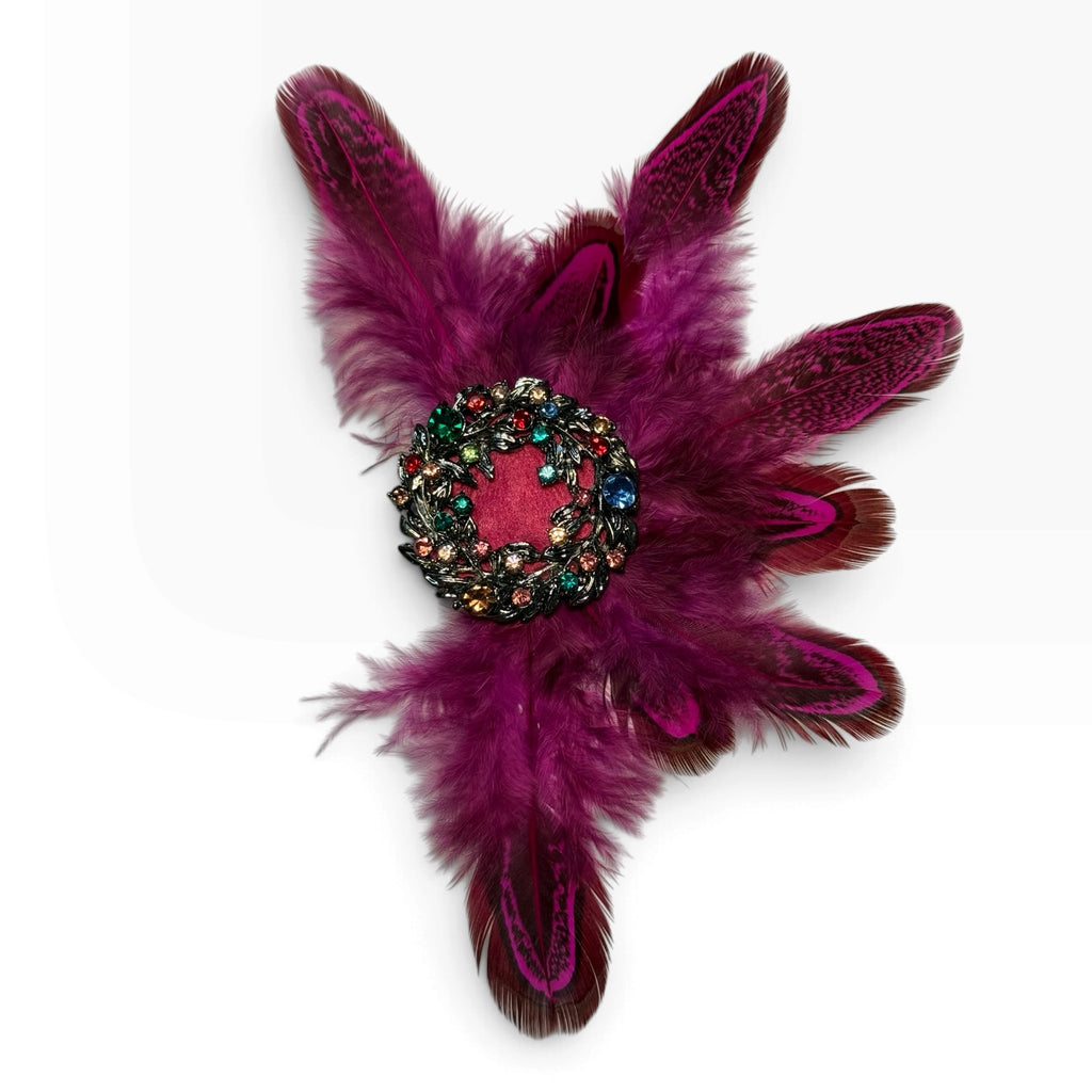 Broche de plumas